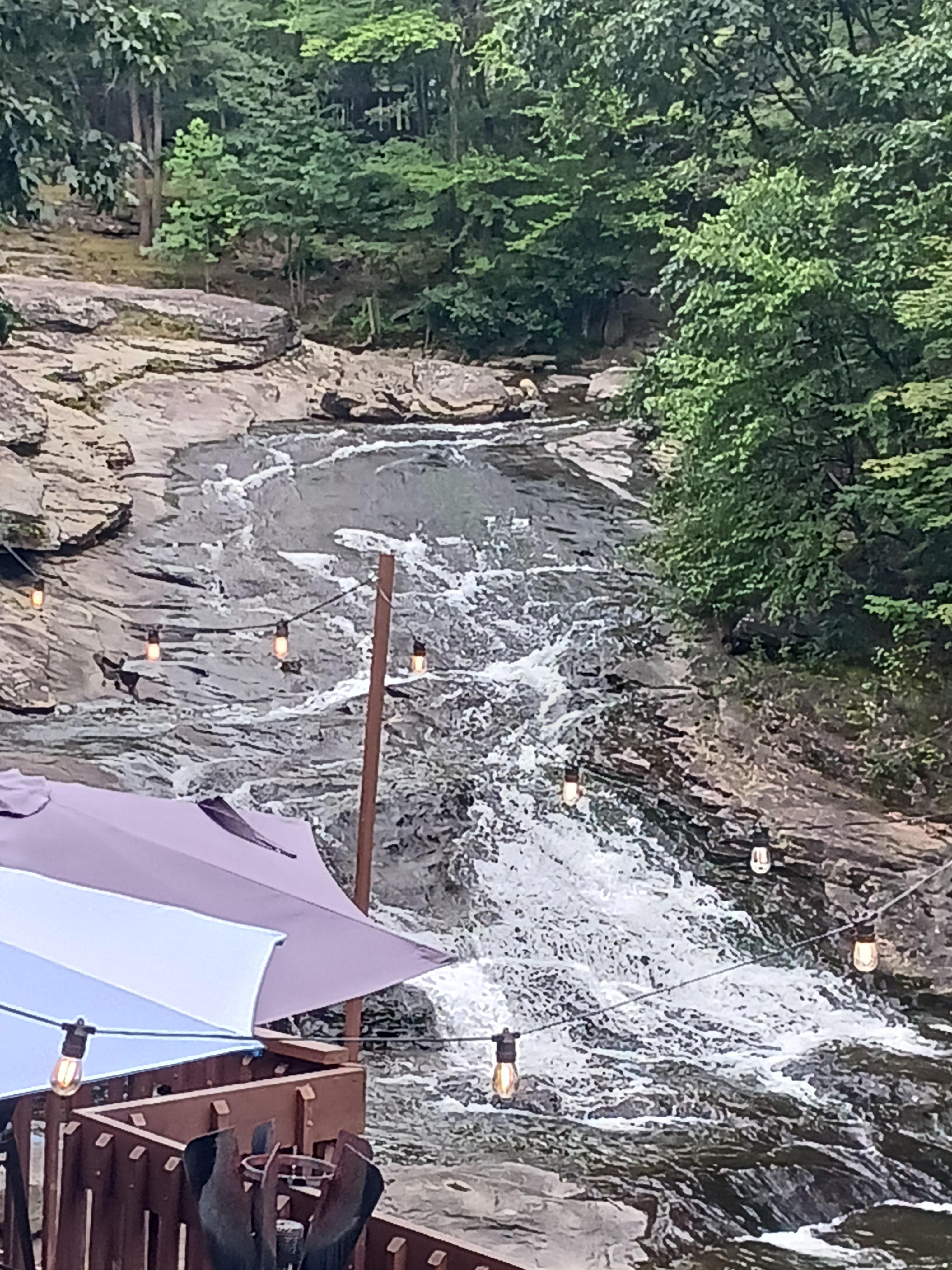 Sitting eating our dinner, listening to the water.