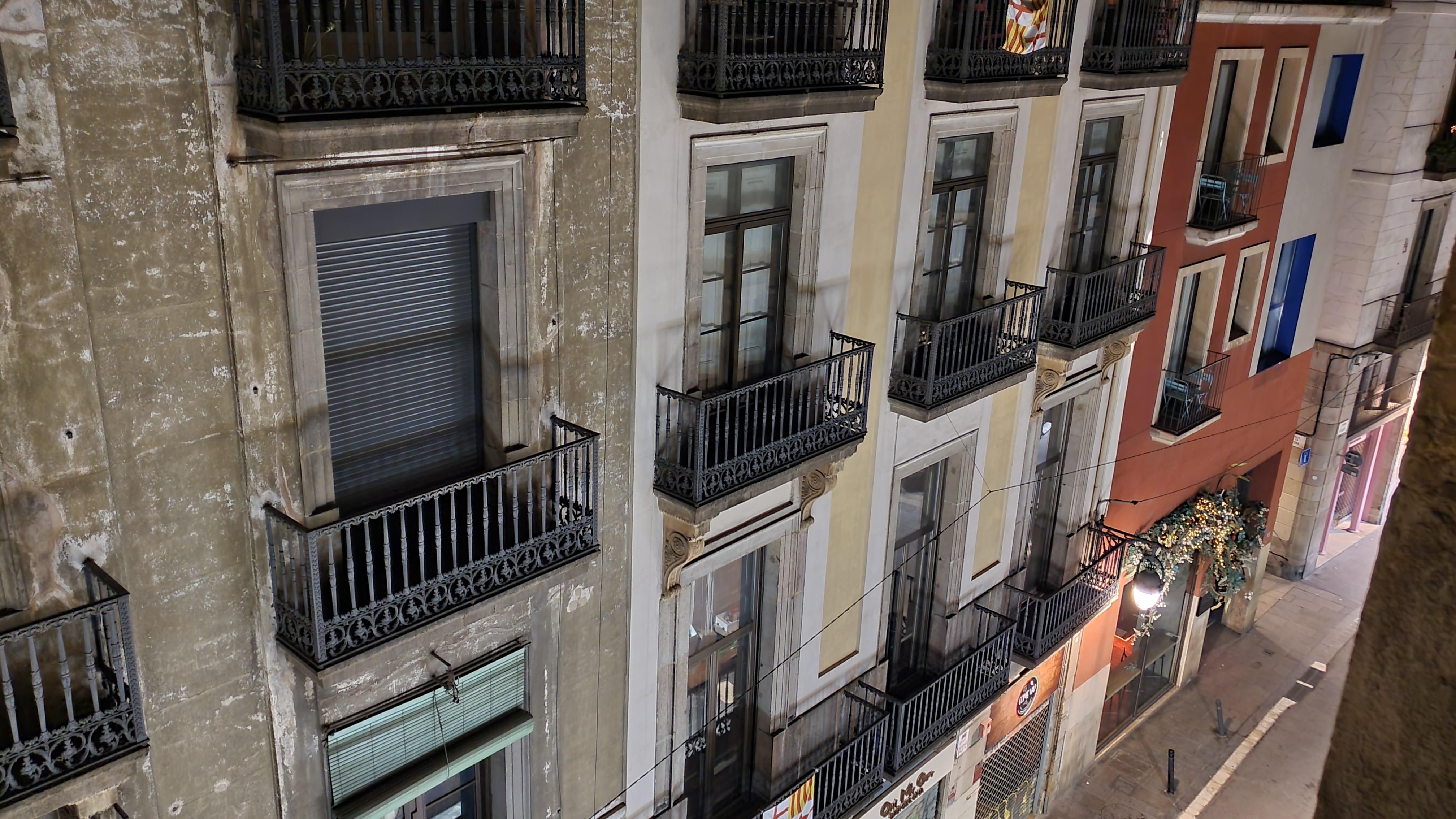 Street taken from the large opening window of the room