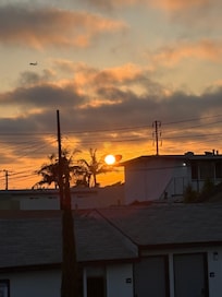 Sunset from balcony. Didnt see entire sunset but that was special to end our trip