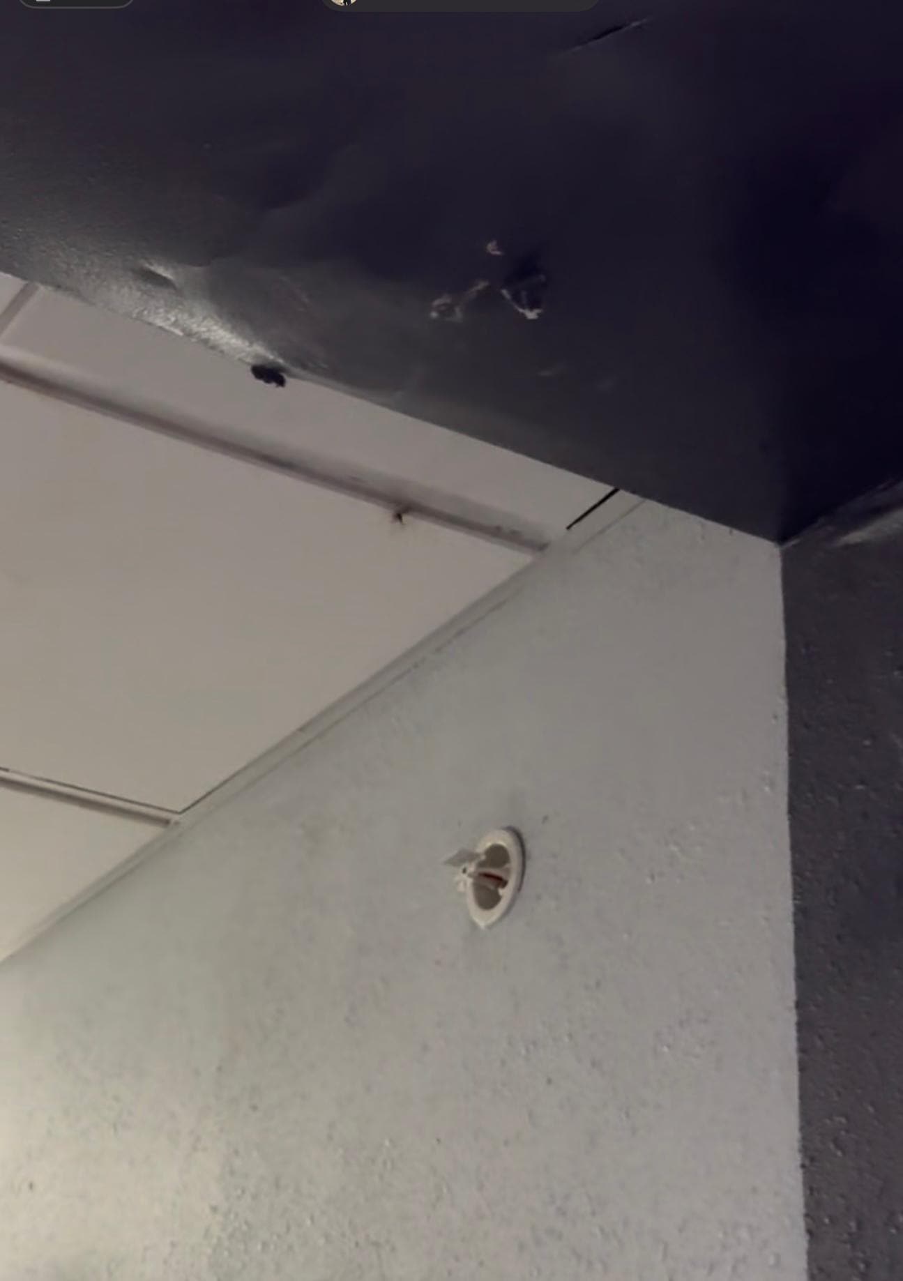 Water damaged ceiling looking like it will cave down on your head at any moment 