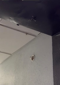 Water damaged ceiling looking like it will cave down on your head at any moment