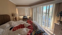 The room was extremely bright with broken blinds and 6:00 am sunrise