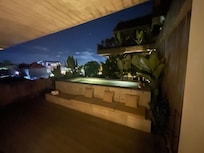 Private pool with the room at night