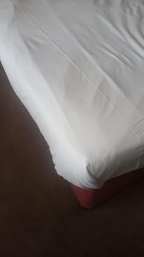 Flecken auf dem Betttuch
