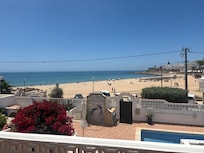 View of the beach from the patio and all of the bedrooms