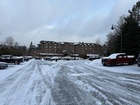 Back of the hotel, where the parking is