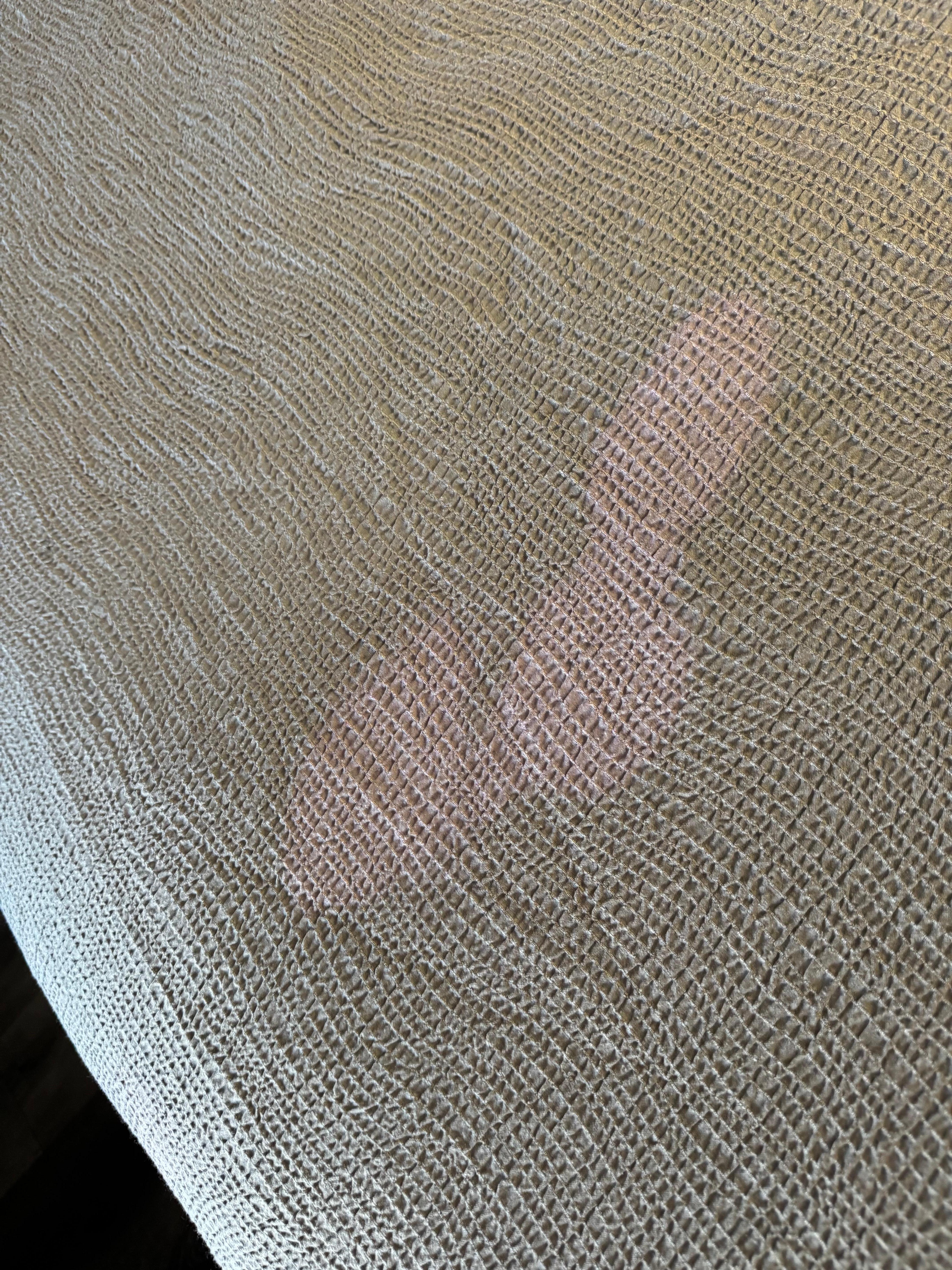 Dirty linen with bleach spots