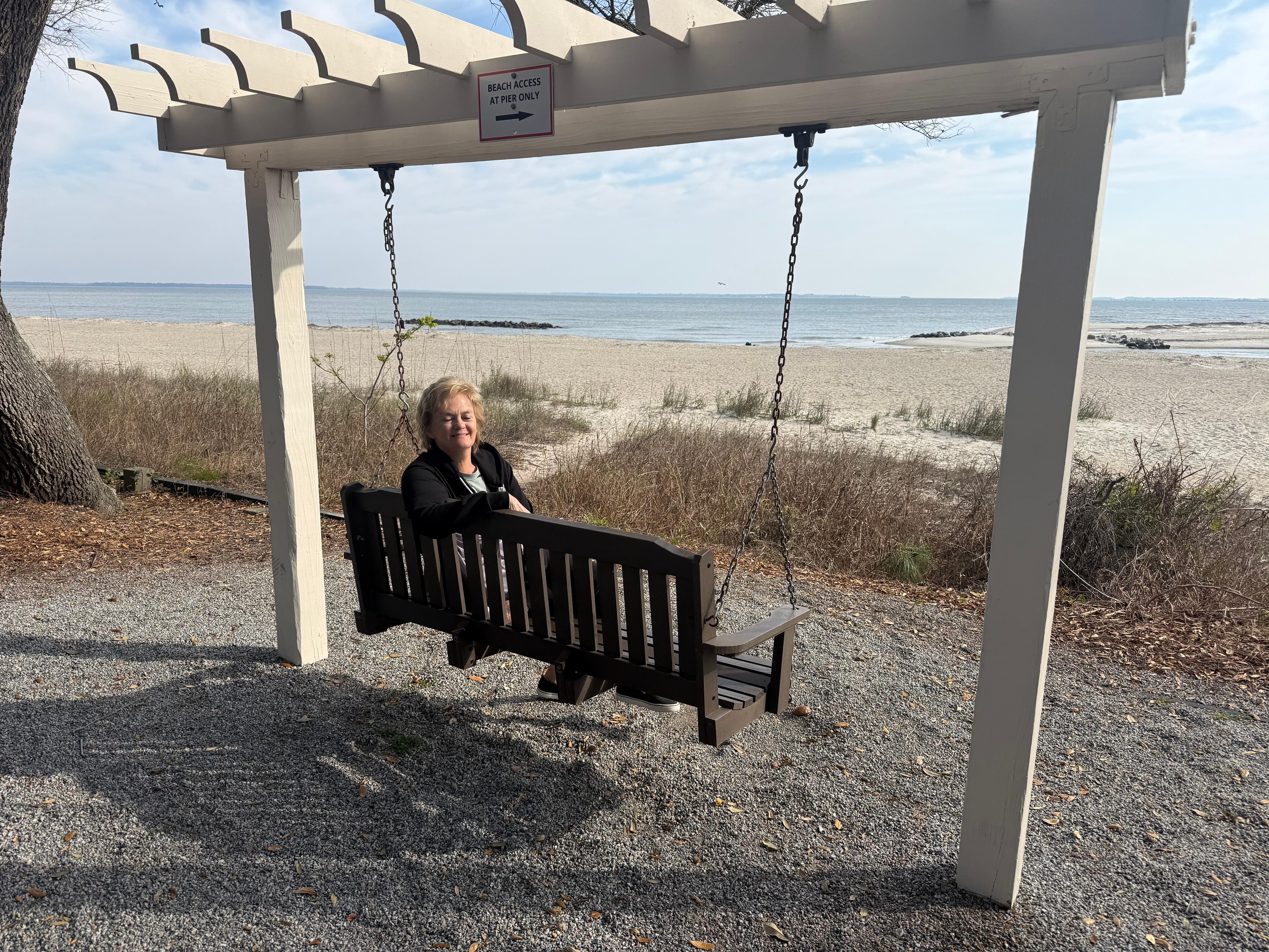 Porch swings overlook the beach