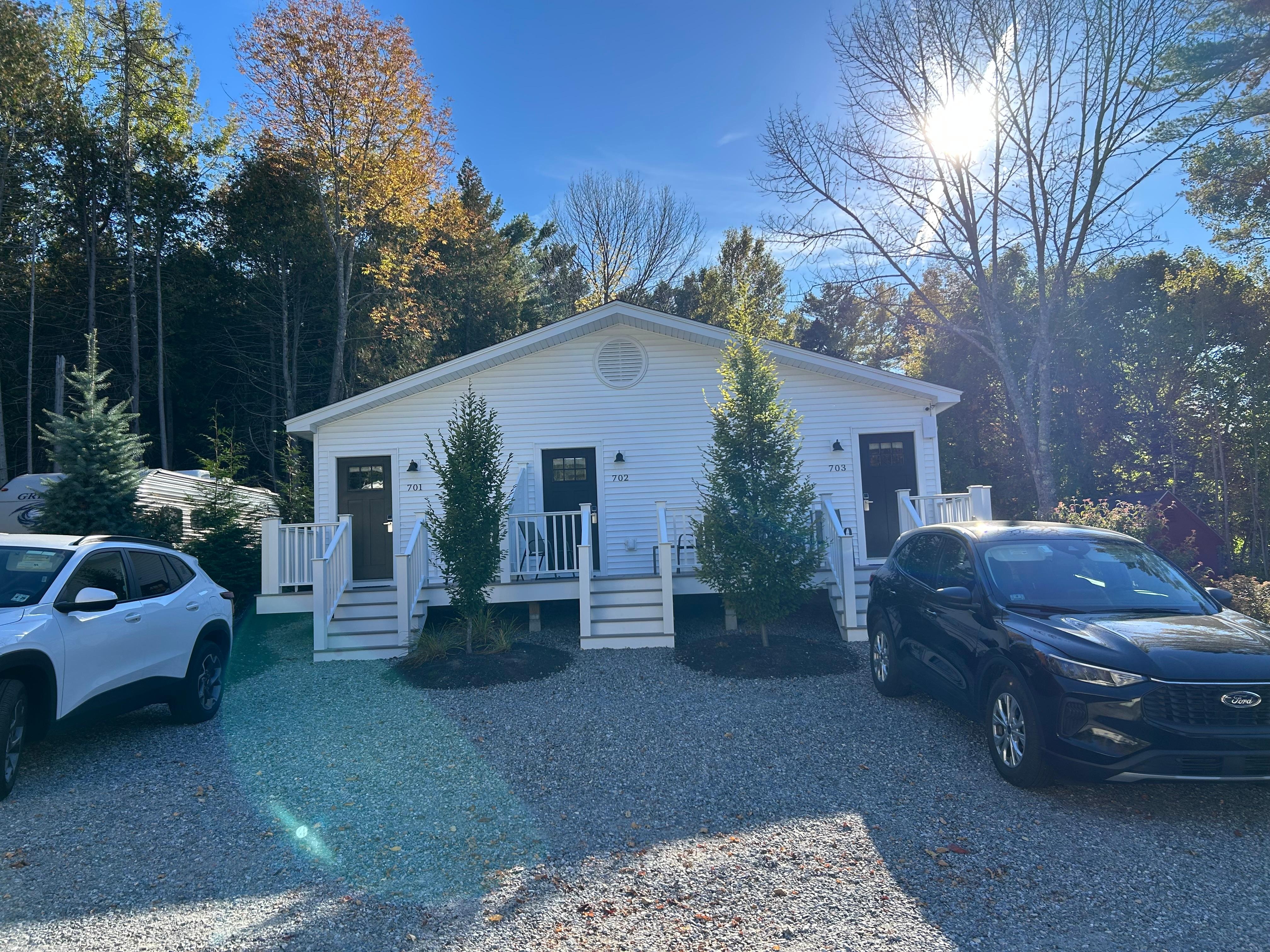 Queen bed with small kitchenette.  Part of a 3 plex