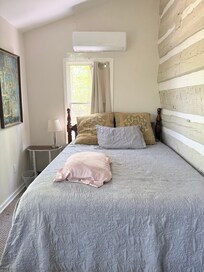 Downstairs queen size oh so comfy bed.