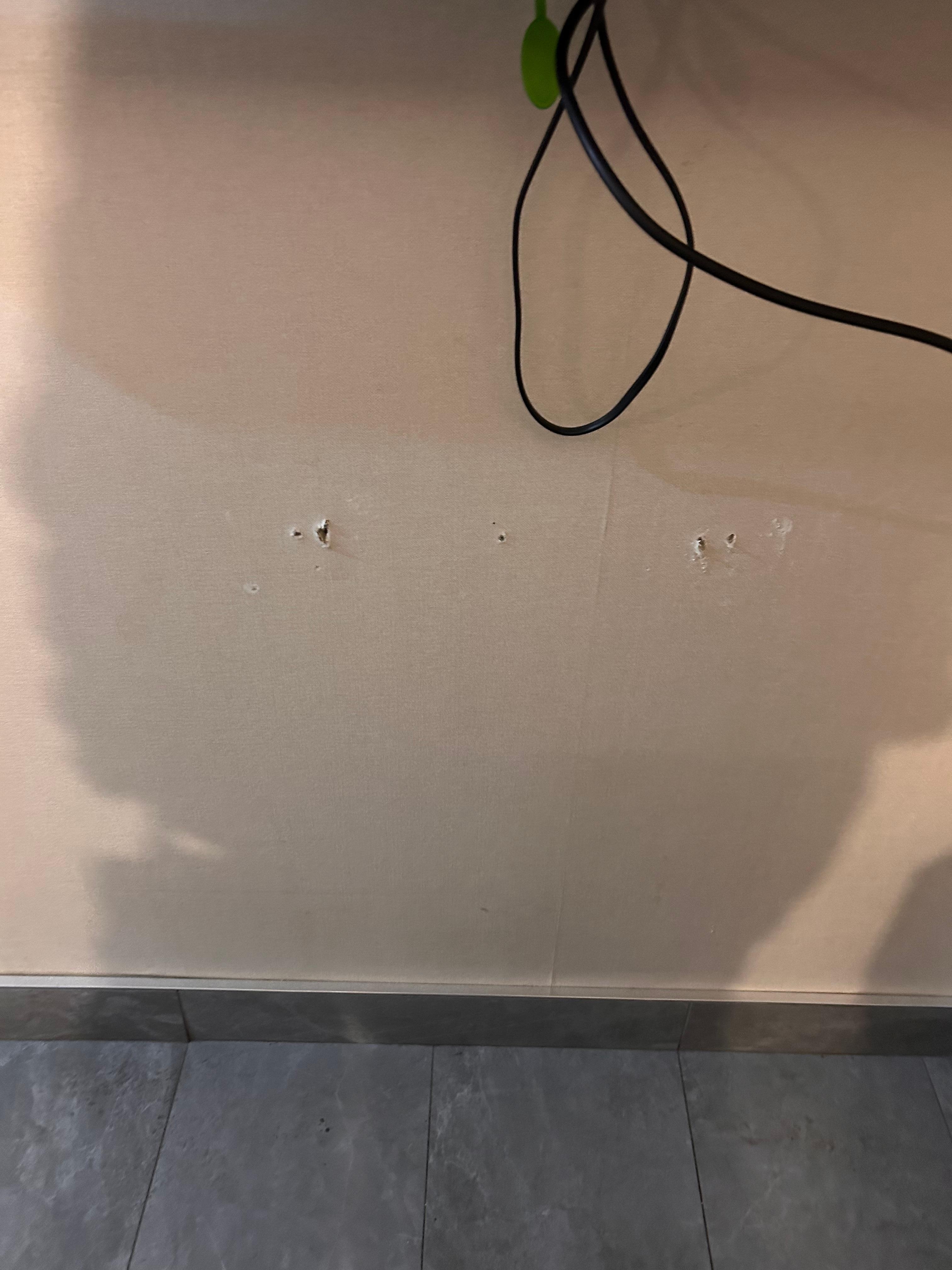 the walls had holes and a bunch of stains 