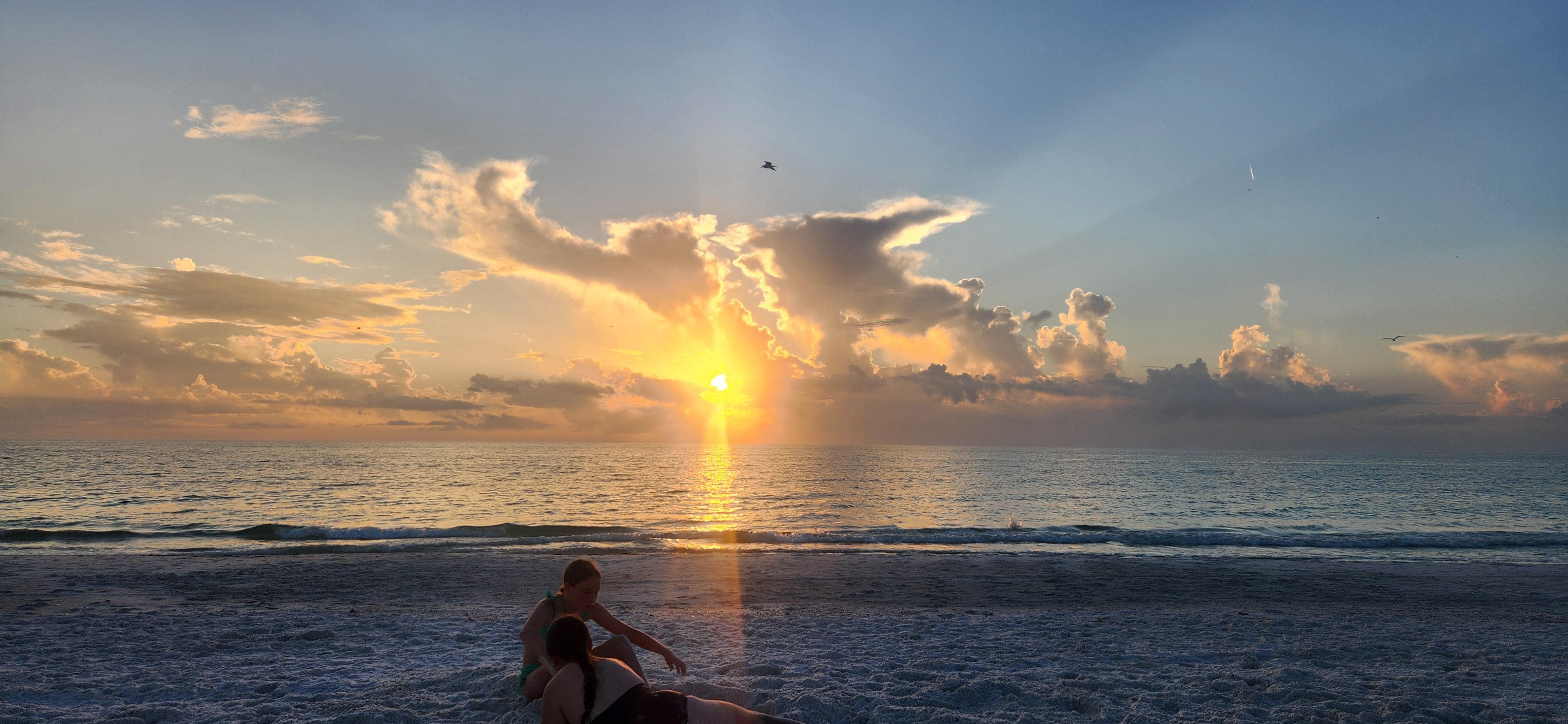Sunset on the beach right outside of this condo.