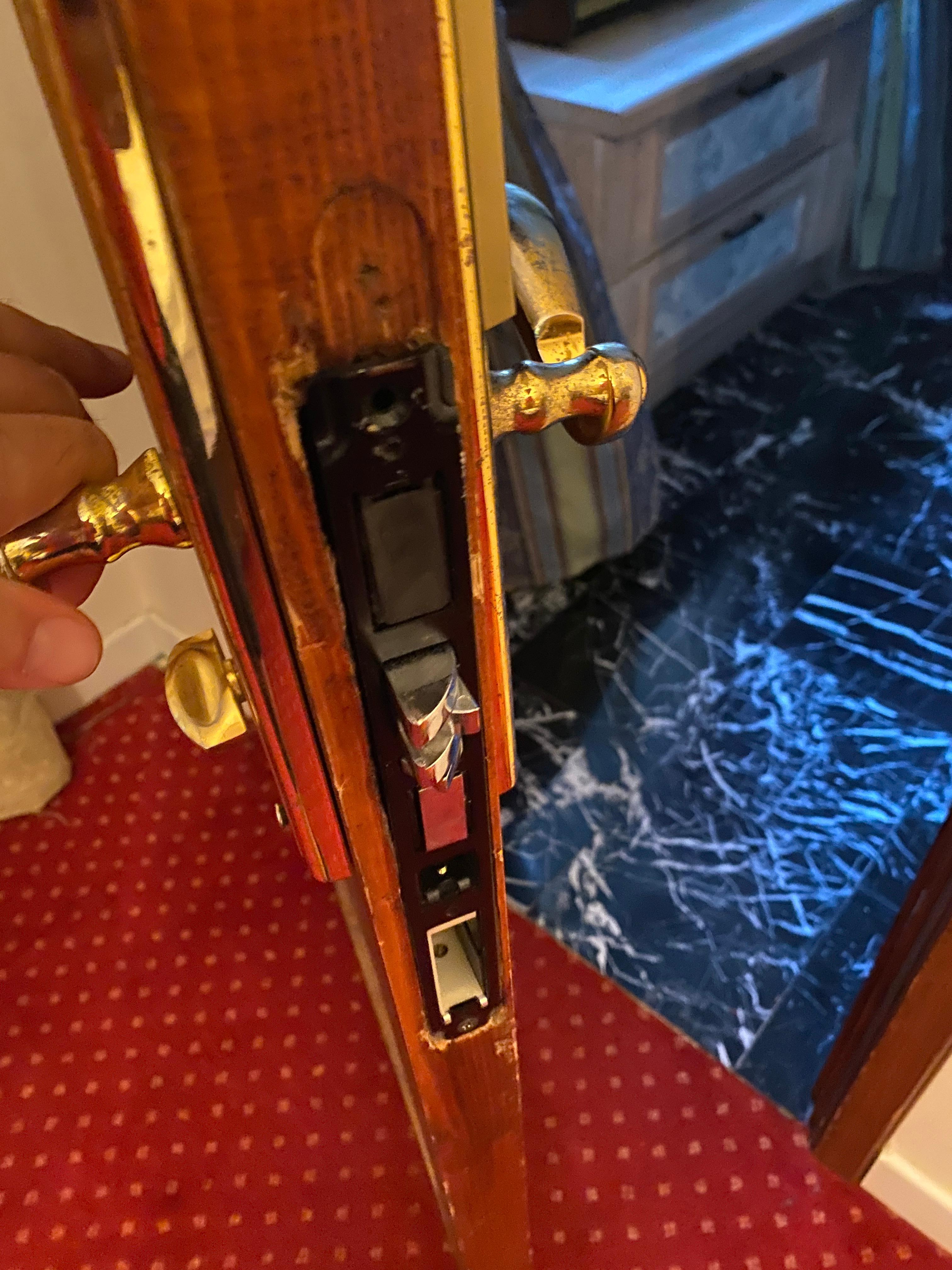 Door and lock is almost falling apart.