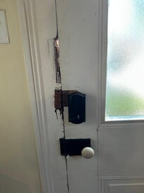 Broken into front door & lock- unfixed.