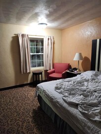 This is what you get in your room, I brought my own sheet to cover on the top, and I have to sleep with my cloths on as the air conditioning is so laud and stink I have to turn it off.