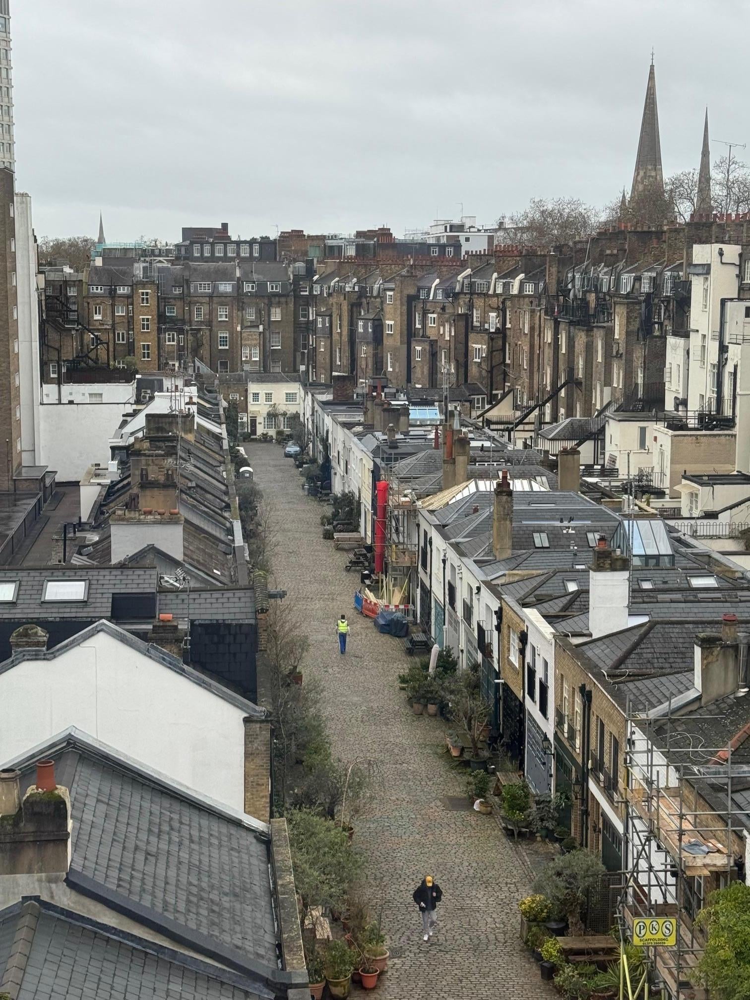 The view from the window overlooks a small historic building that was converted from an old stable — something quite rare to see in London.