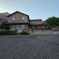 View of unit attached to bike shop. *shop was not an issue or distraction. We actually rented a bike for the evening and locked it up when we were done. Very convenient.