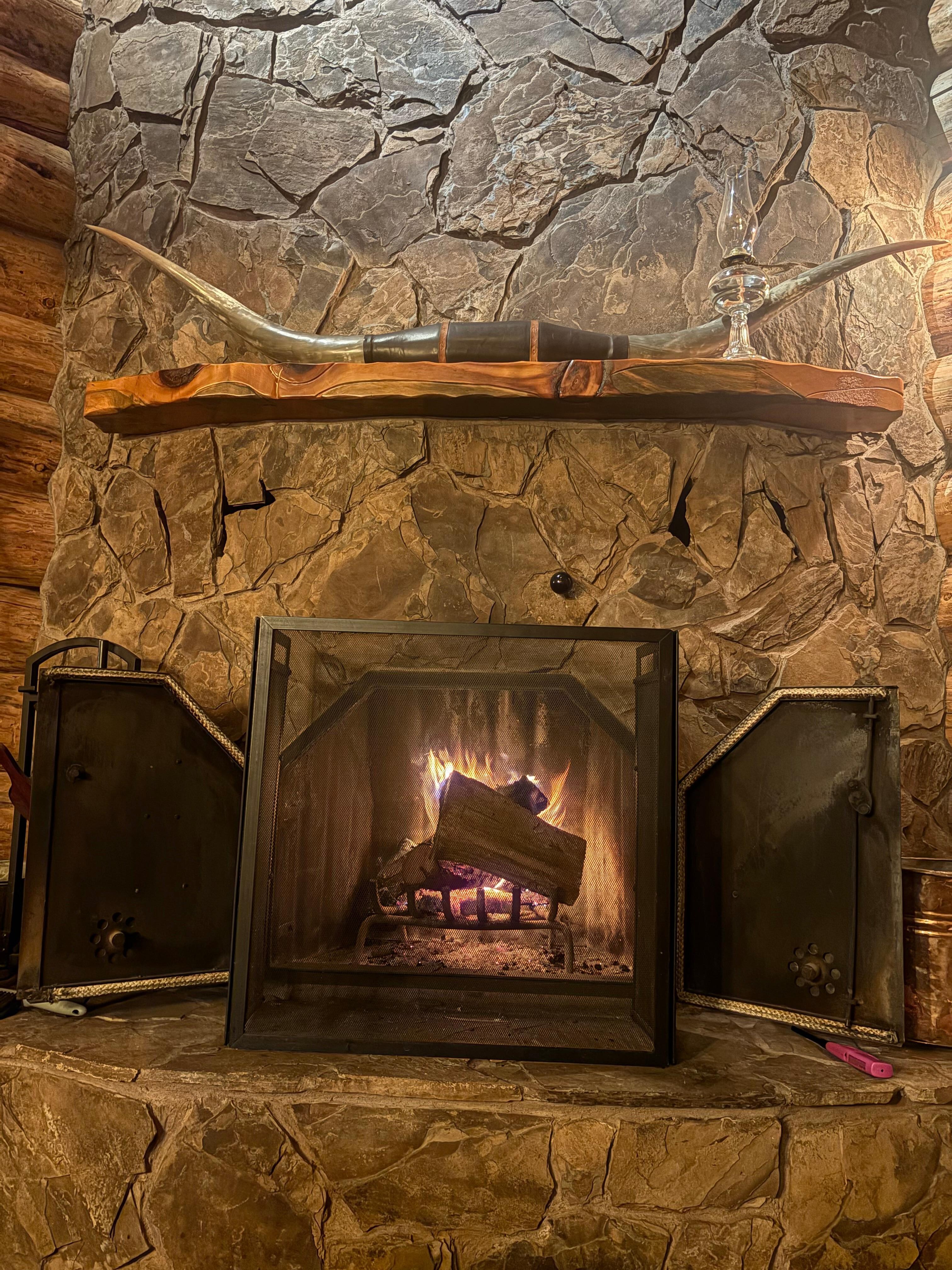 Cozy fireplace with ample wood to burn. 