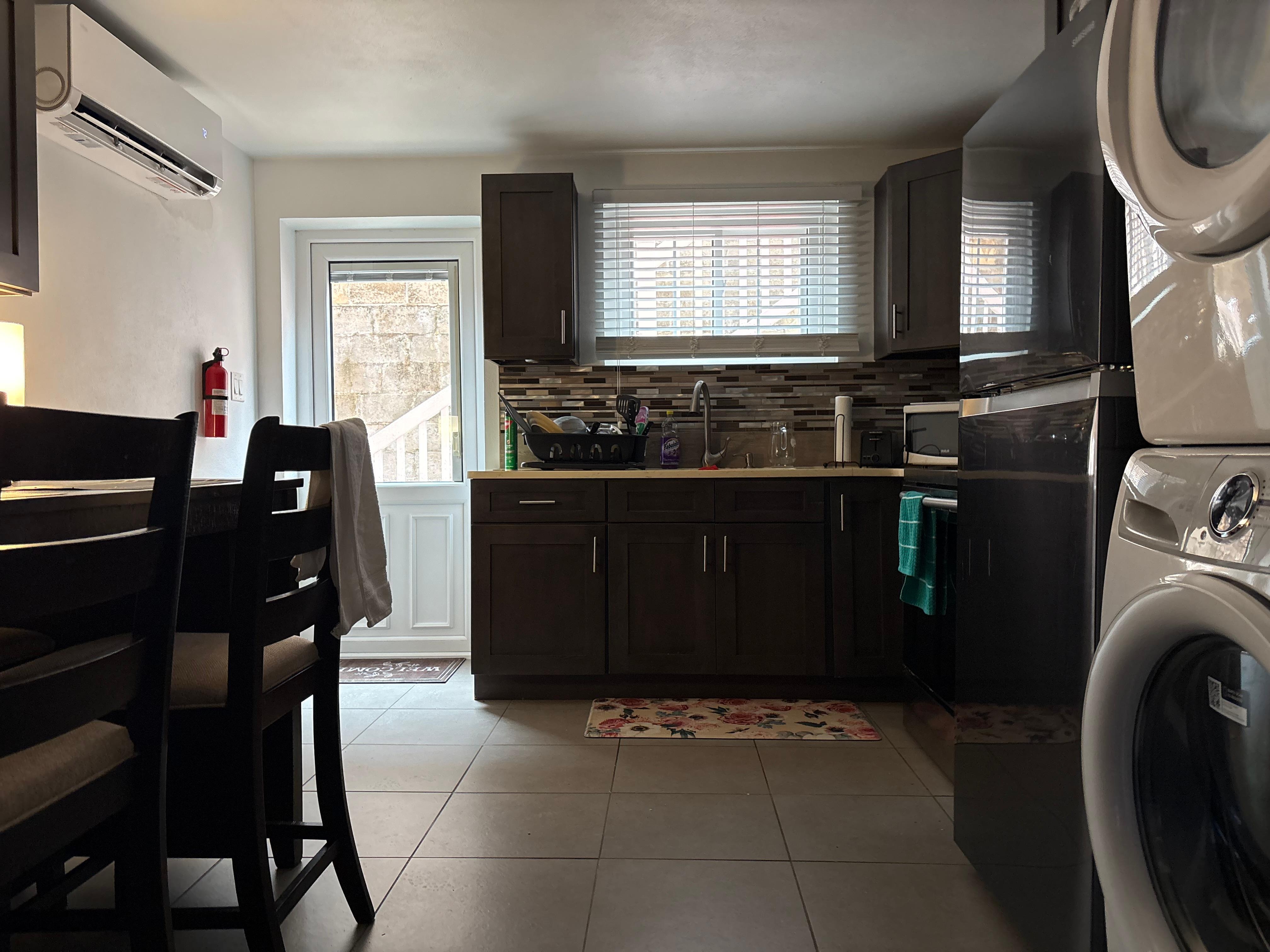 Rather dark kitchen, needs stove top lights.