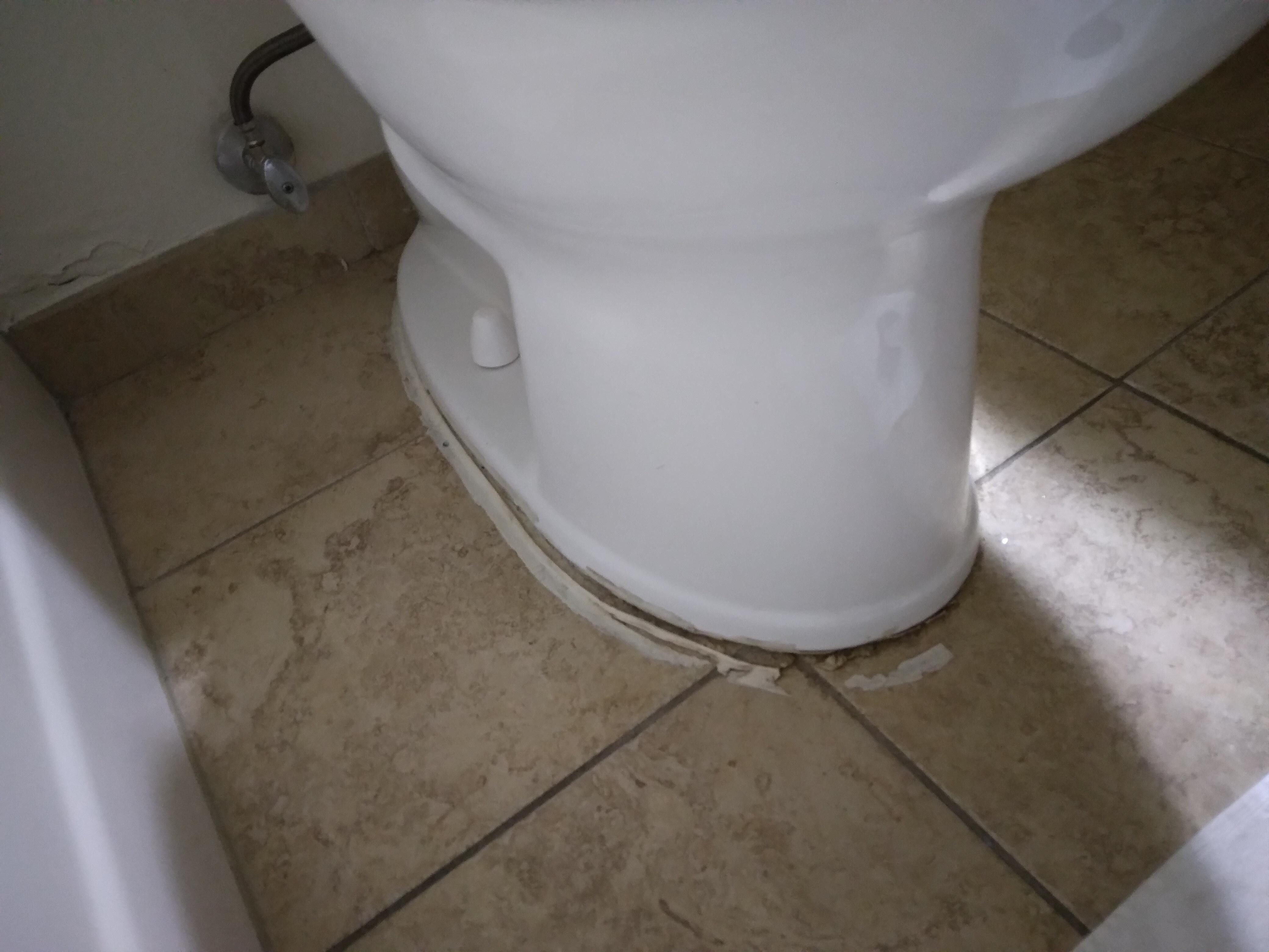 Toilet was loose when set on. No sealant around base
