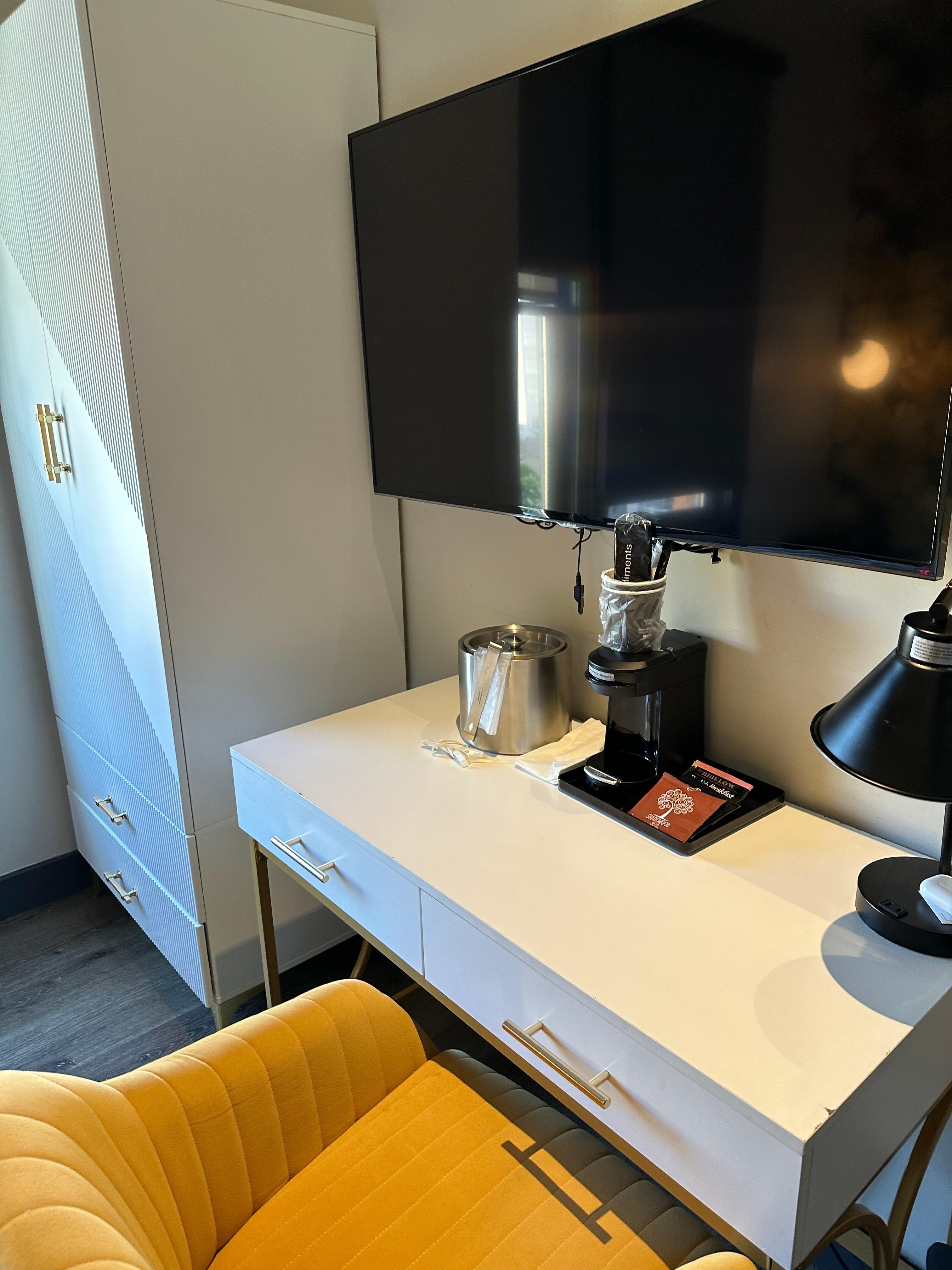 There is coffee and tea, two cups, and sugar.