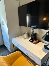 There is coffee and tea, two cups, and sugar.