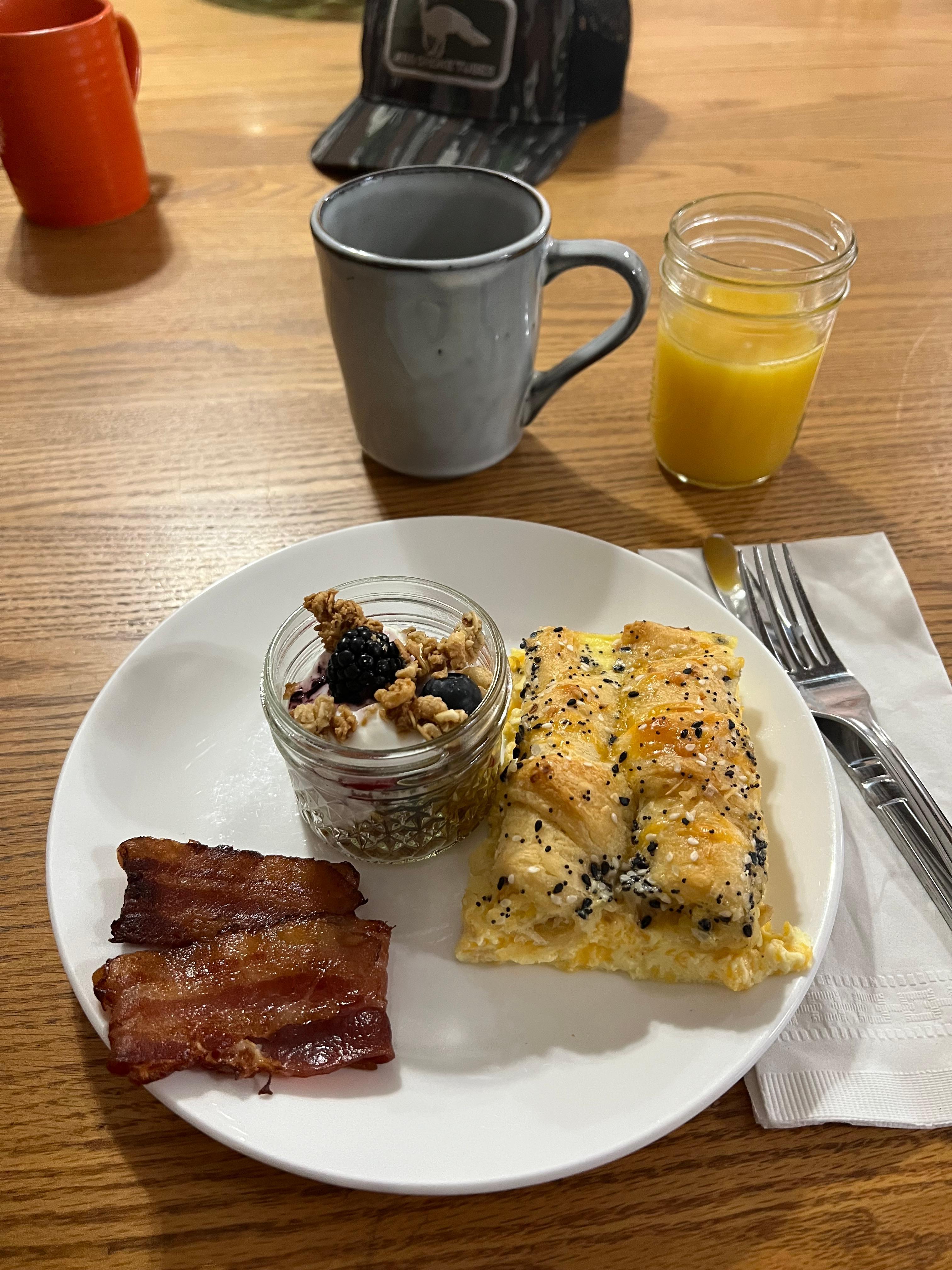 Crescent everything bagel casserole with fruit parfait and bacon. 