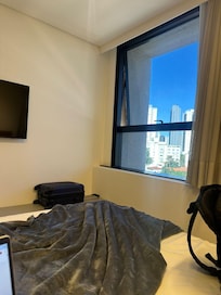 Visão da cama e de Goiânia