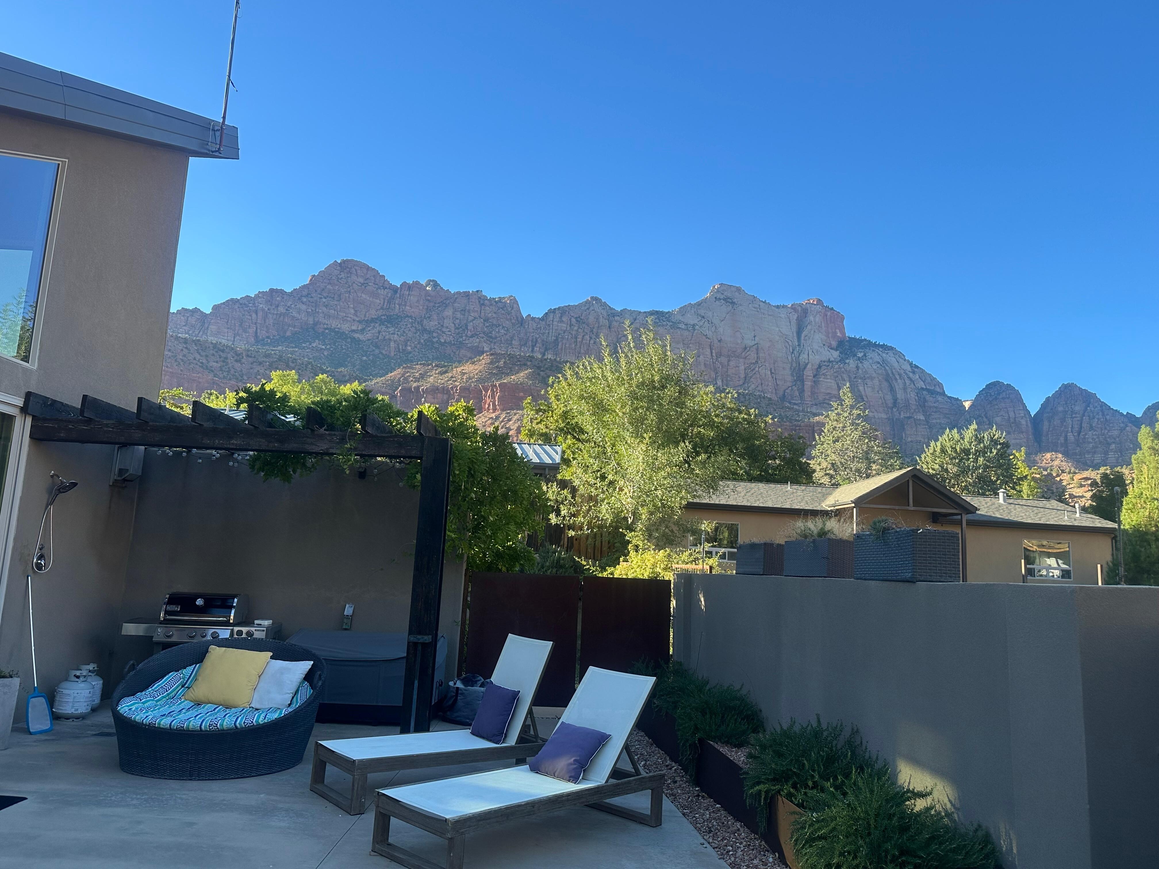 Look at those beautiful mountains in the background while hanging out on the patio!