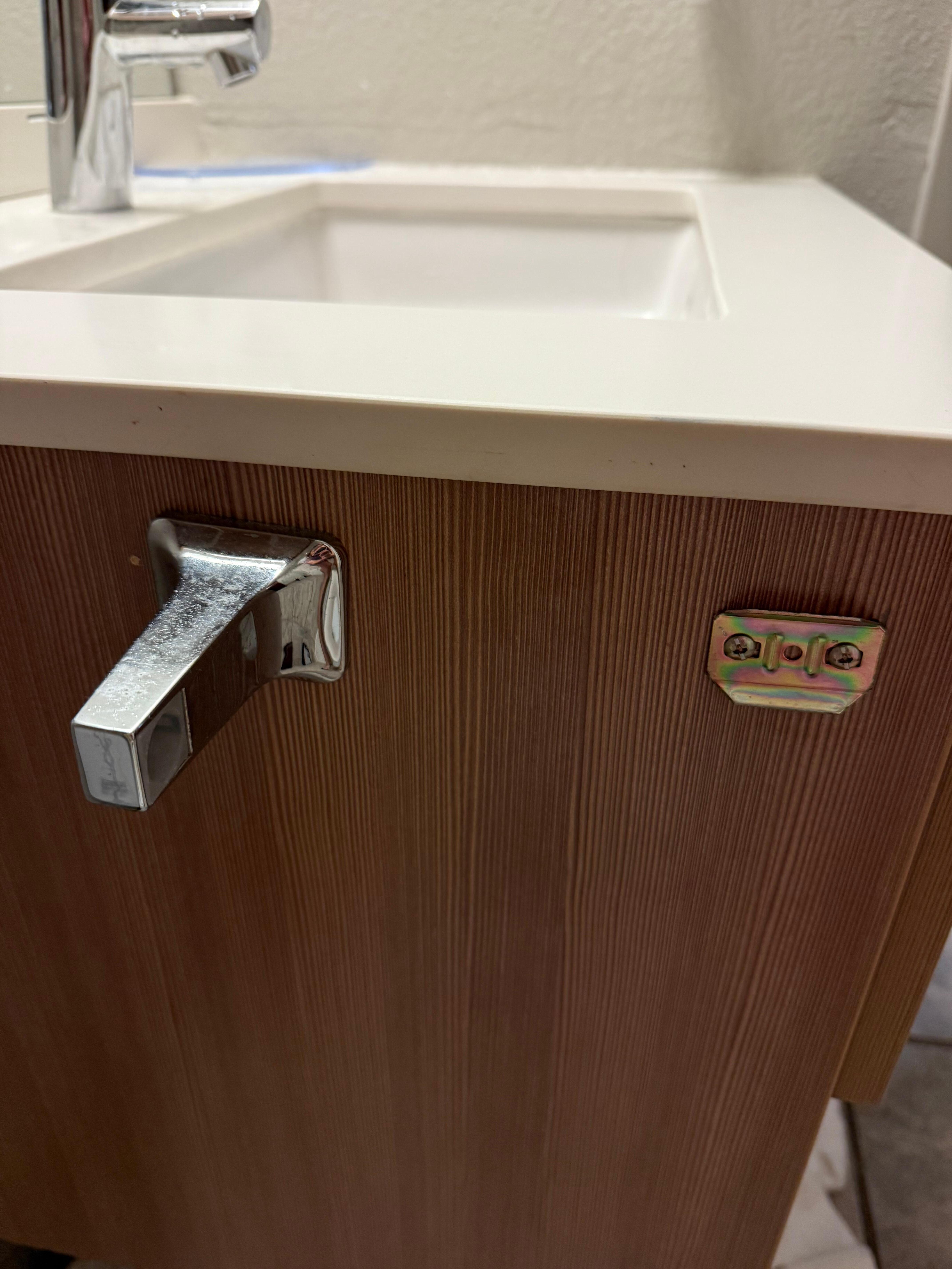 No place to put the roll of toilet paper. 