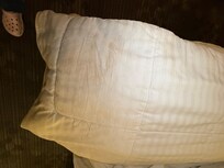 Dirty bedding that had not been changed from previous guest