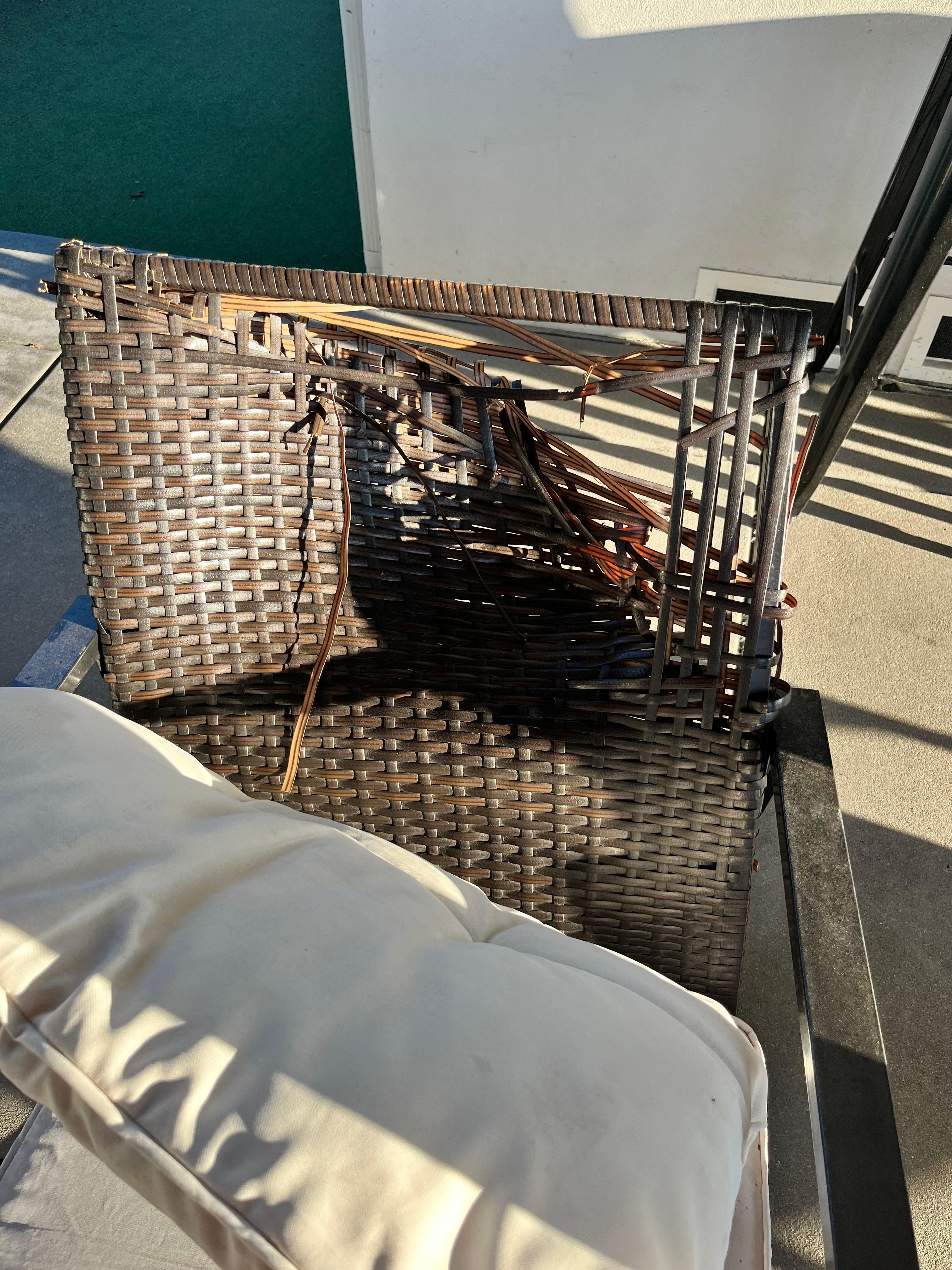 Hole in chair back covered by a cushion