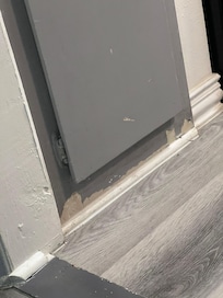 Kitchen baseboards into living room