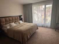 A study in brown - king firm bed with great feather pillows