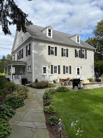 View from the back of the house and walking to the entry door.
