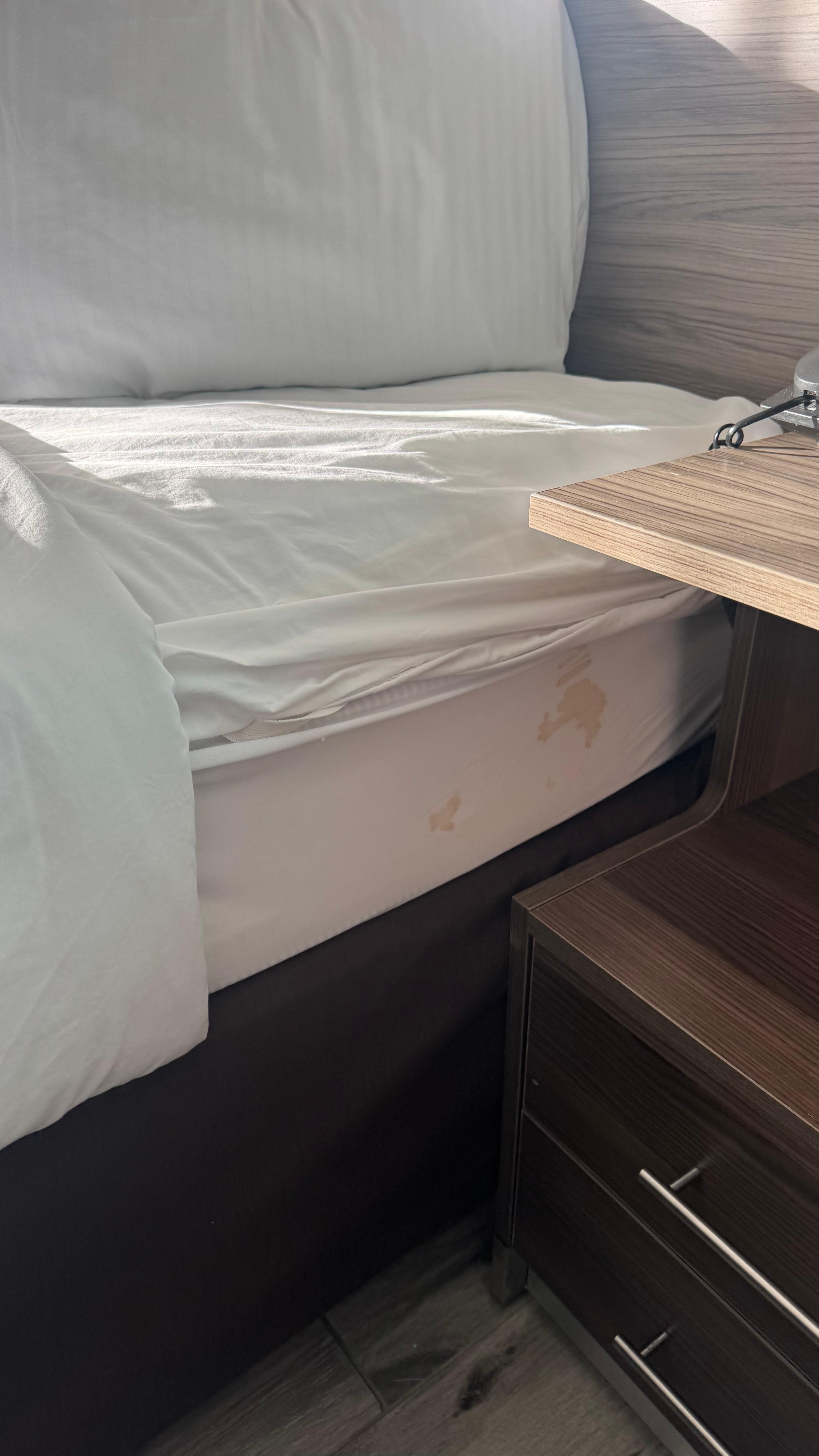 Stained bedding and it wasn’t even properly made. It looked like someone had already been in it. 