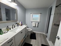 Two spotless bathrooms