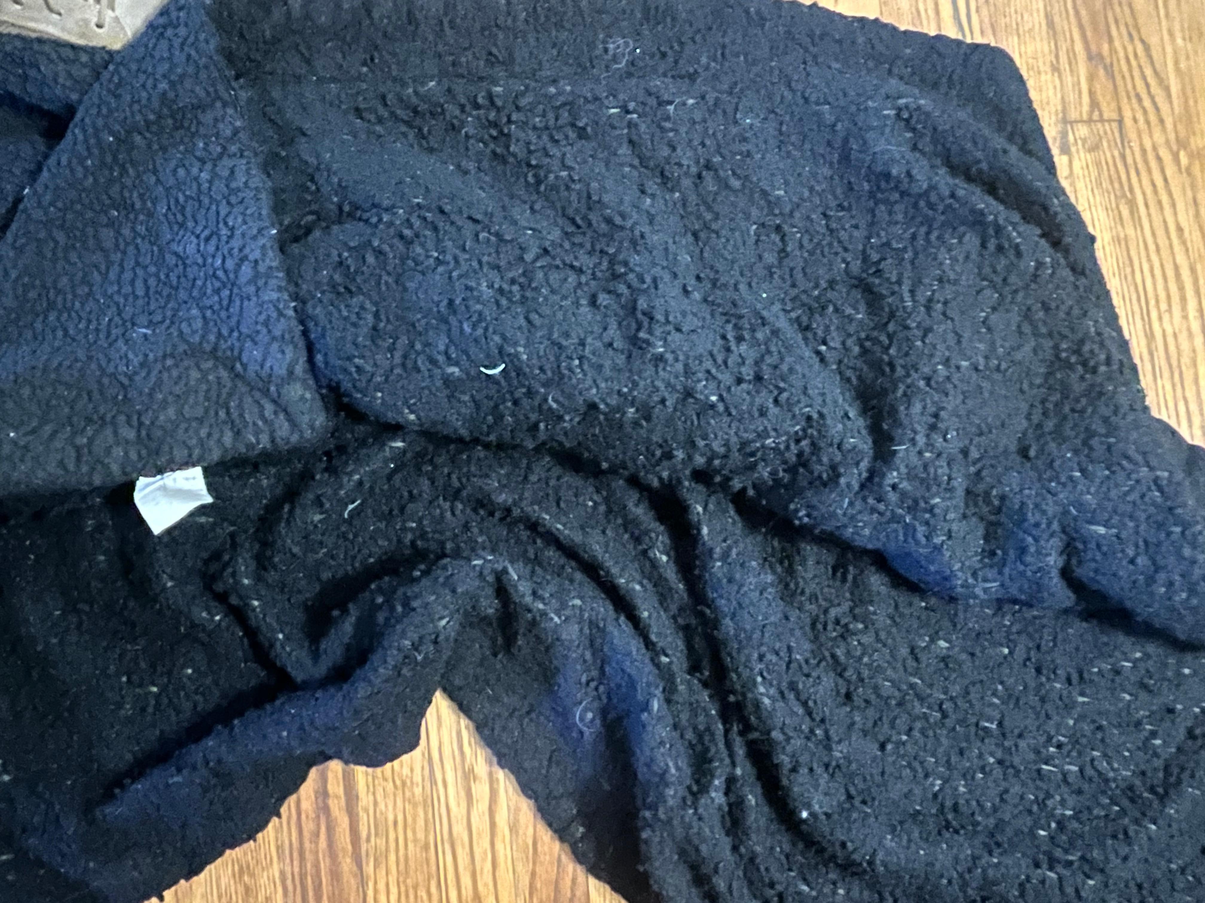 Blanket covered in dog hair and what appeared to be pubic hair