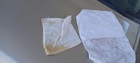 They keep the room towels stacked on right next 2 the sink which is why the small 1 on the left has a little coffee on but I was still charged for it even tho I could have ran the rag under some hot water n ring it out n it would have been clean agai