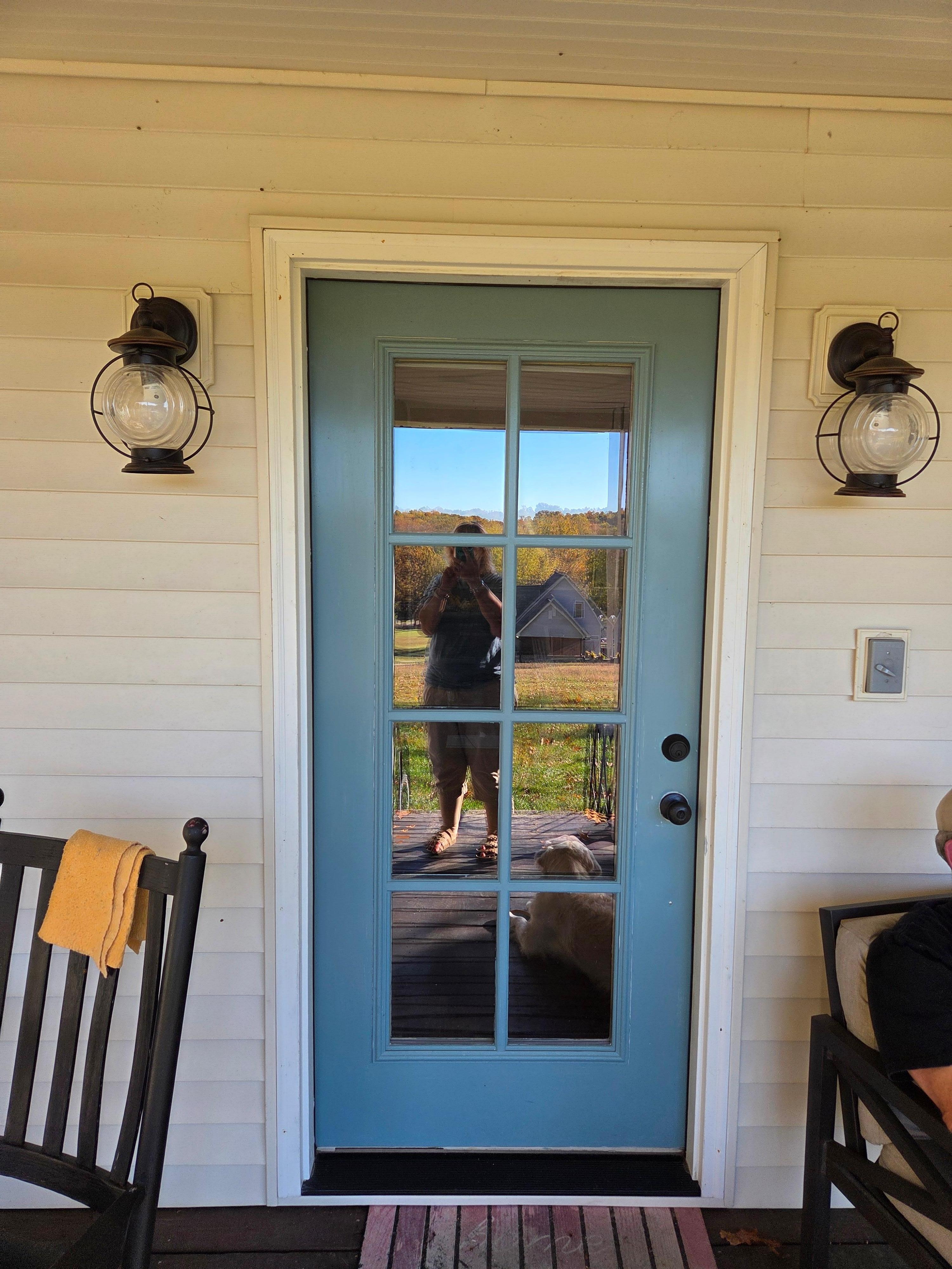 Door to the porch, which is huge and comfortable