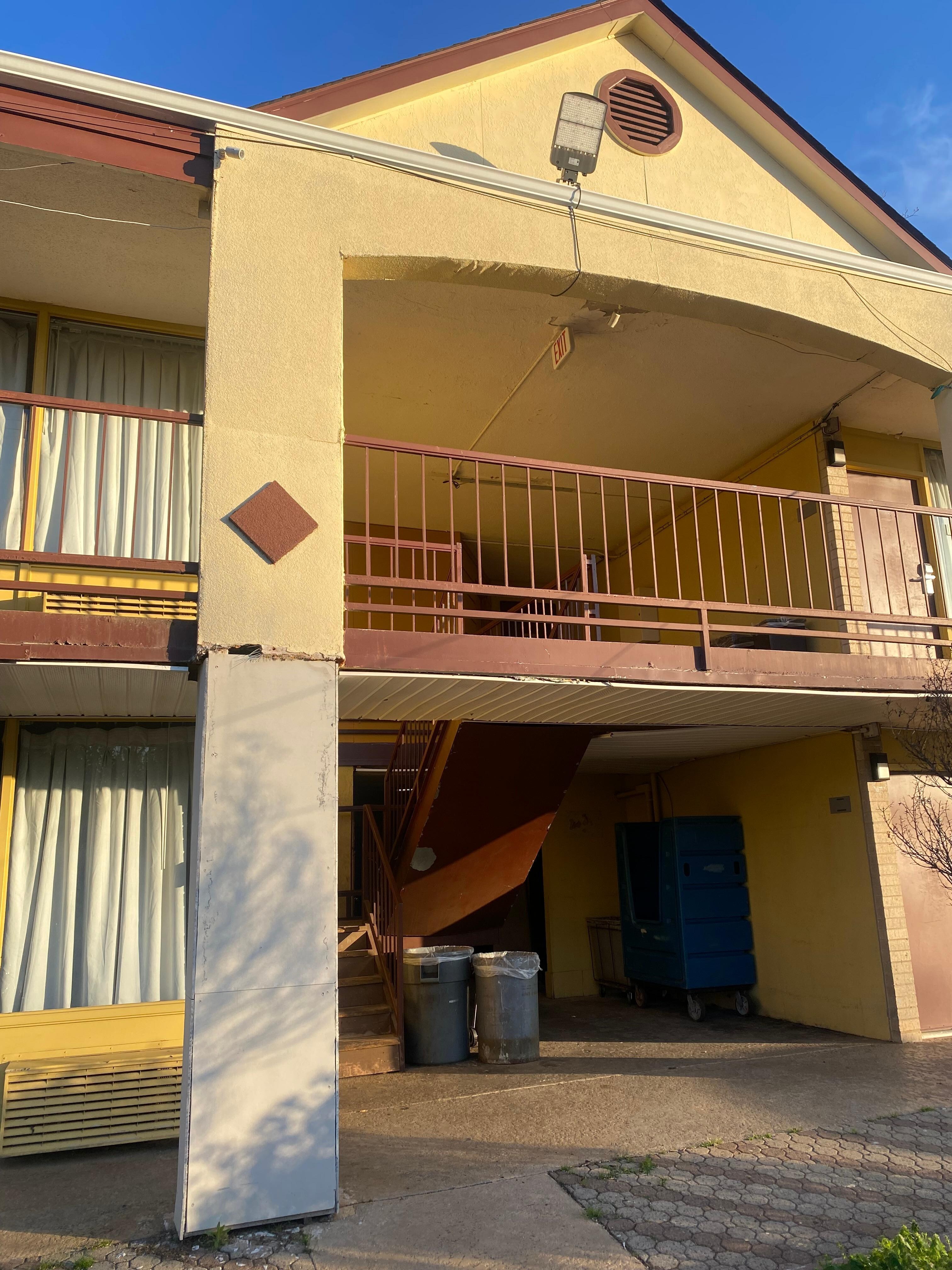 The outside of the building is falling apart