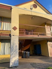 The outside of the building is falling apart