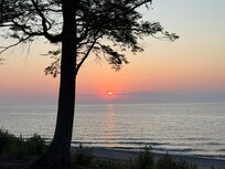 A sunset from the deck’s lounge chair
