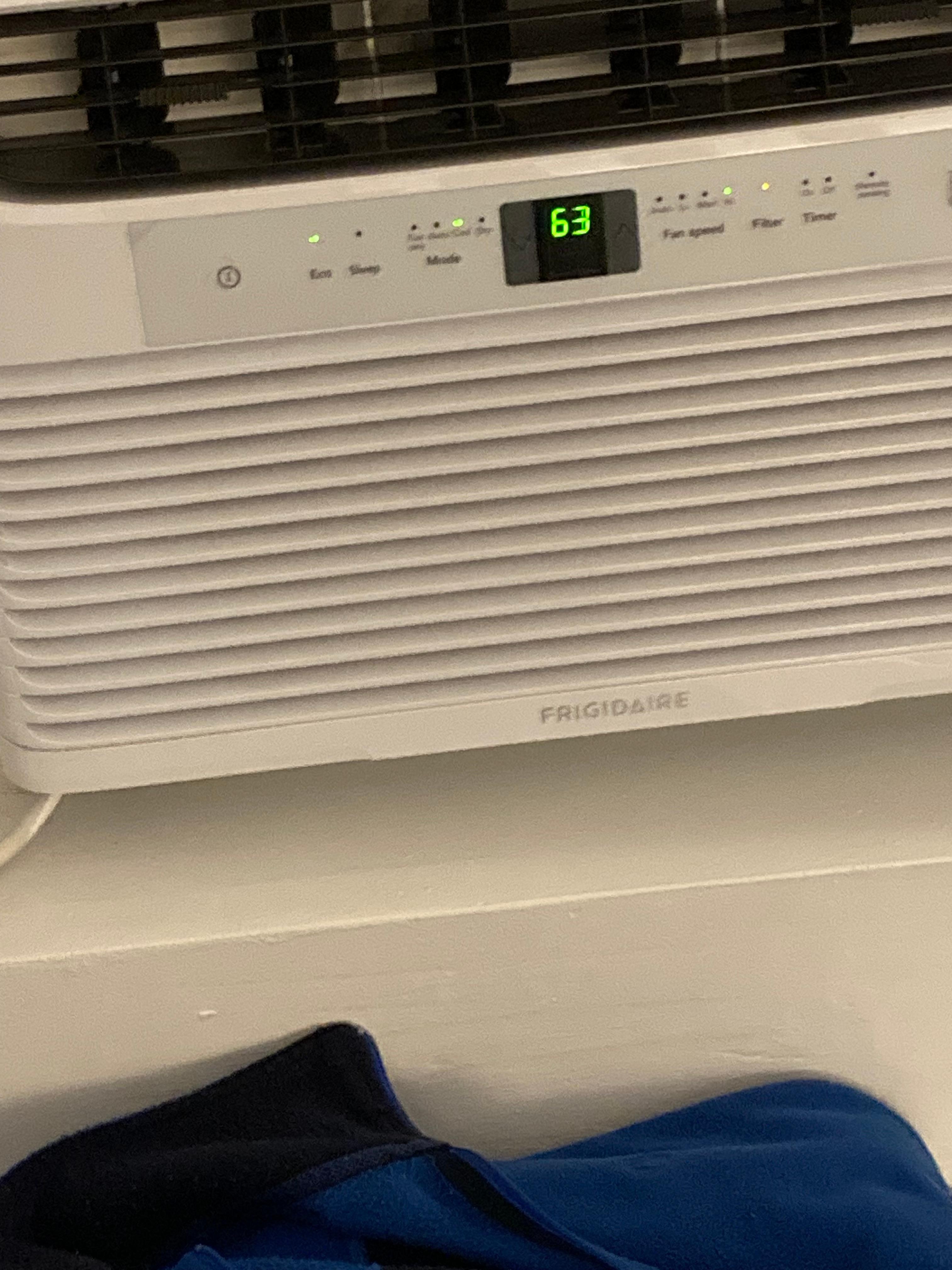 The photos of the air conditioner show the temperature we set it to and the photo of the remote shows the temperature with the ac running