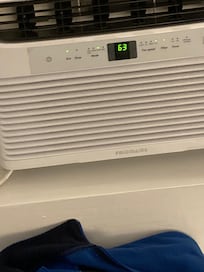 The photos of the air conditioner show the temperature we set it to and the photo of the remote shows the temperature with the ac running