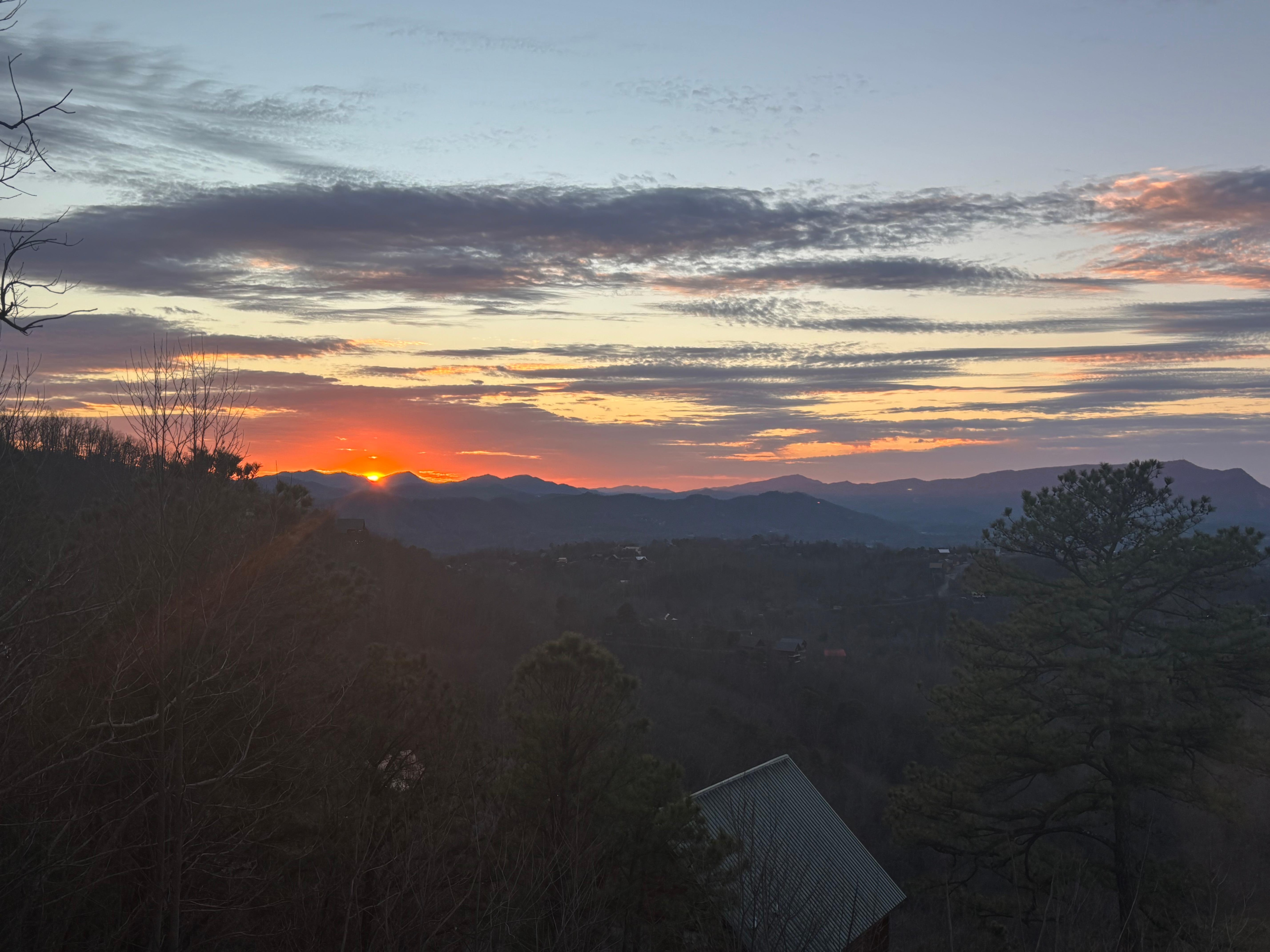 View of the sunset from the living room window ❤️