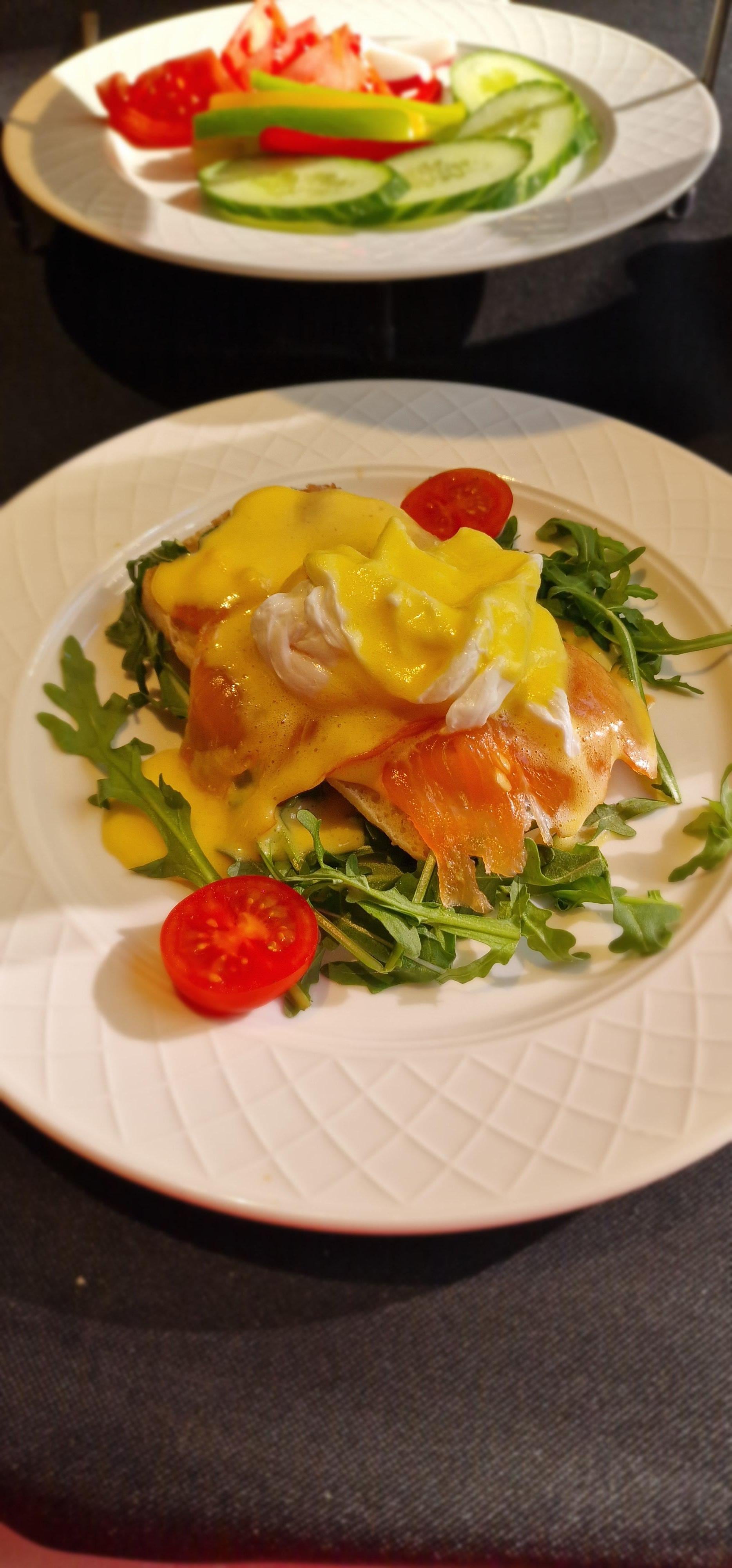 Egg benedict with hollandaise sauce and salmon