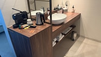 Mini fridge and a safe along with a coffee maker…