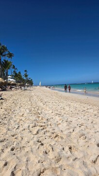 The beach was beautiful. Soft white sand and the ocean very swimable
