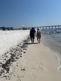Walking along the water’s edge is the perfect vacation spot.
